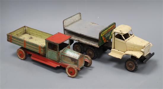 Two spring loaded French tin plate pick up trucks